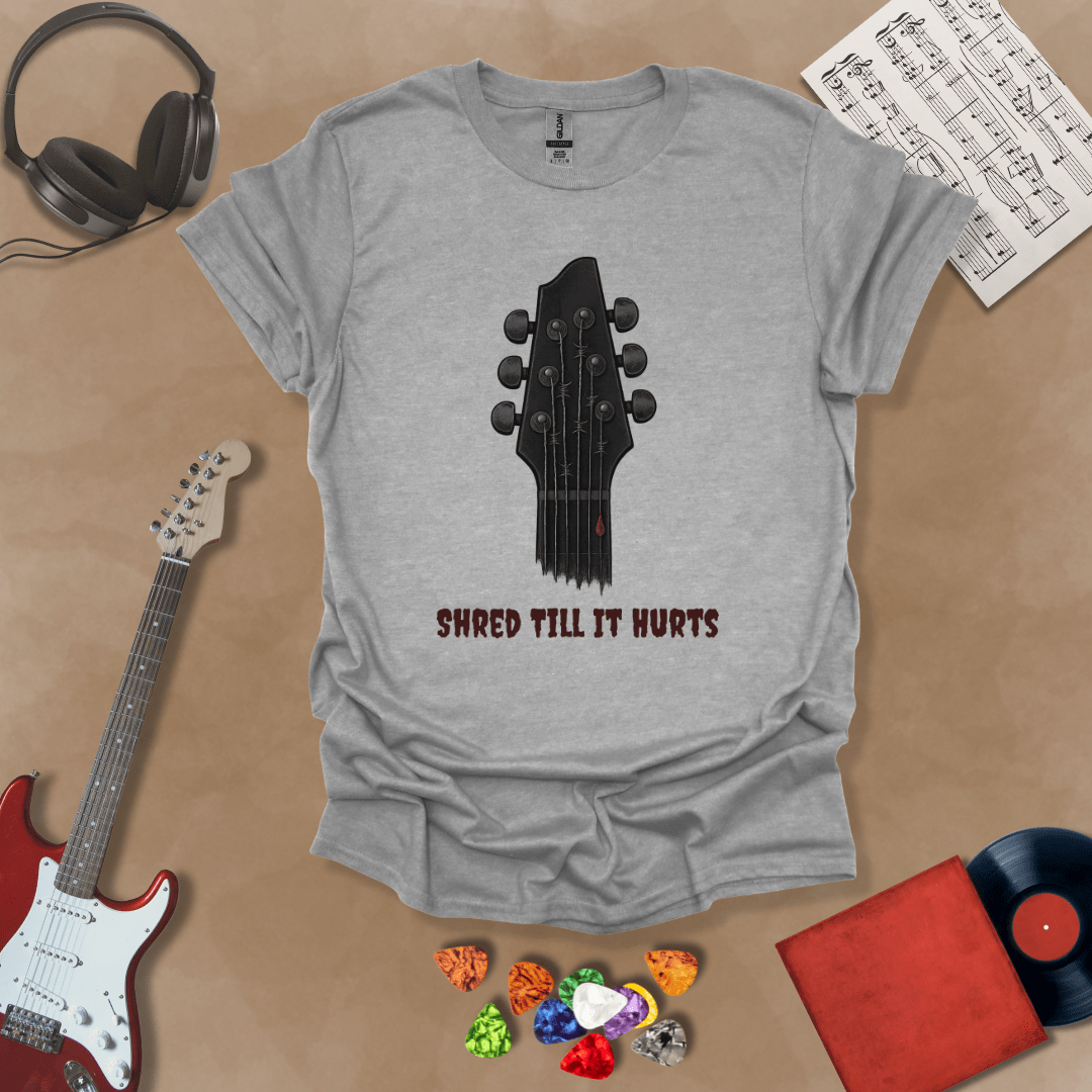 Gray t-shirt with distressed guitar graphic, text “Shred ’Til It Hurts.”