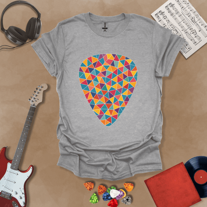 Gray t-shirt featuring a colorful mosaic-style guitar pick design, made of puzzle-like shapes in multiple vibrant colors.
