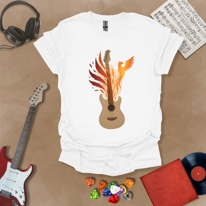 White T-shirt featuring a fiery phoenix rising with wings ablaze, intertwined with a guitar, symbolizing rebirth and the eternal power of music.