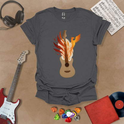 Gray T-shirt featuring a fiery phoenix rising with wings ablaze, intertwined with a guitar, symbolizing rebirth and the eternal power of music.