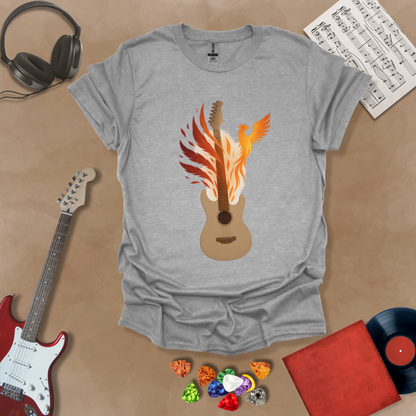 Gray T-shirt featuring a fiery phoenix rising with wings ablaze, intertwined with a guitar, symbolizing rebirth and the eternal power of music.
