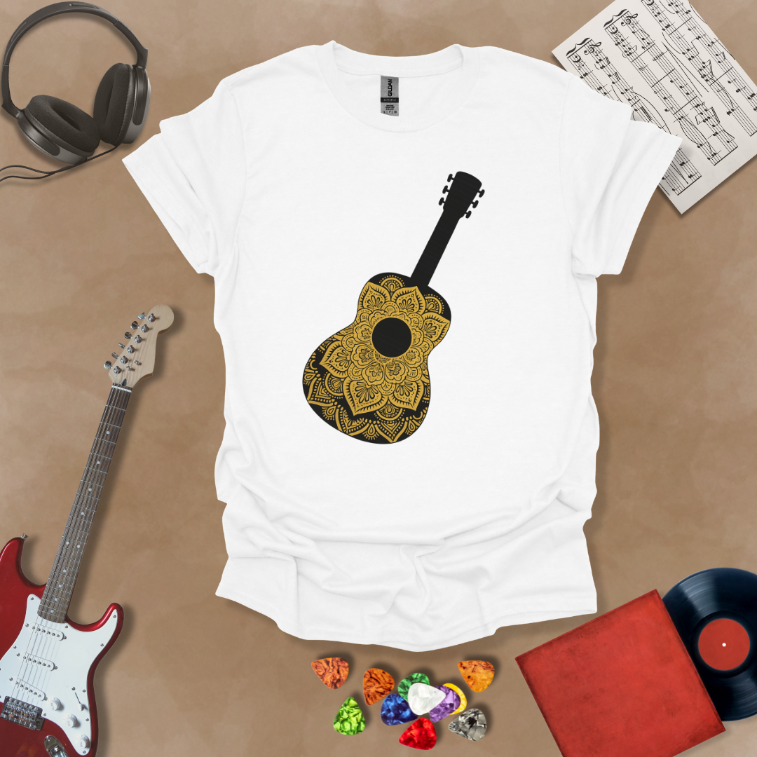 White t-shirt with mandala pattern shaped like guitar body.
