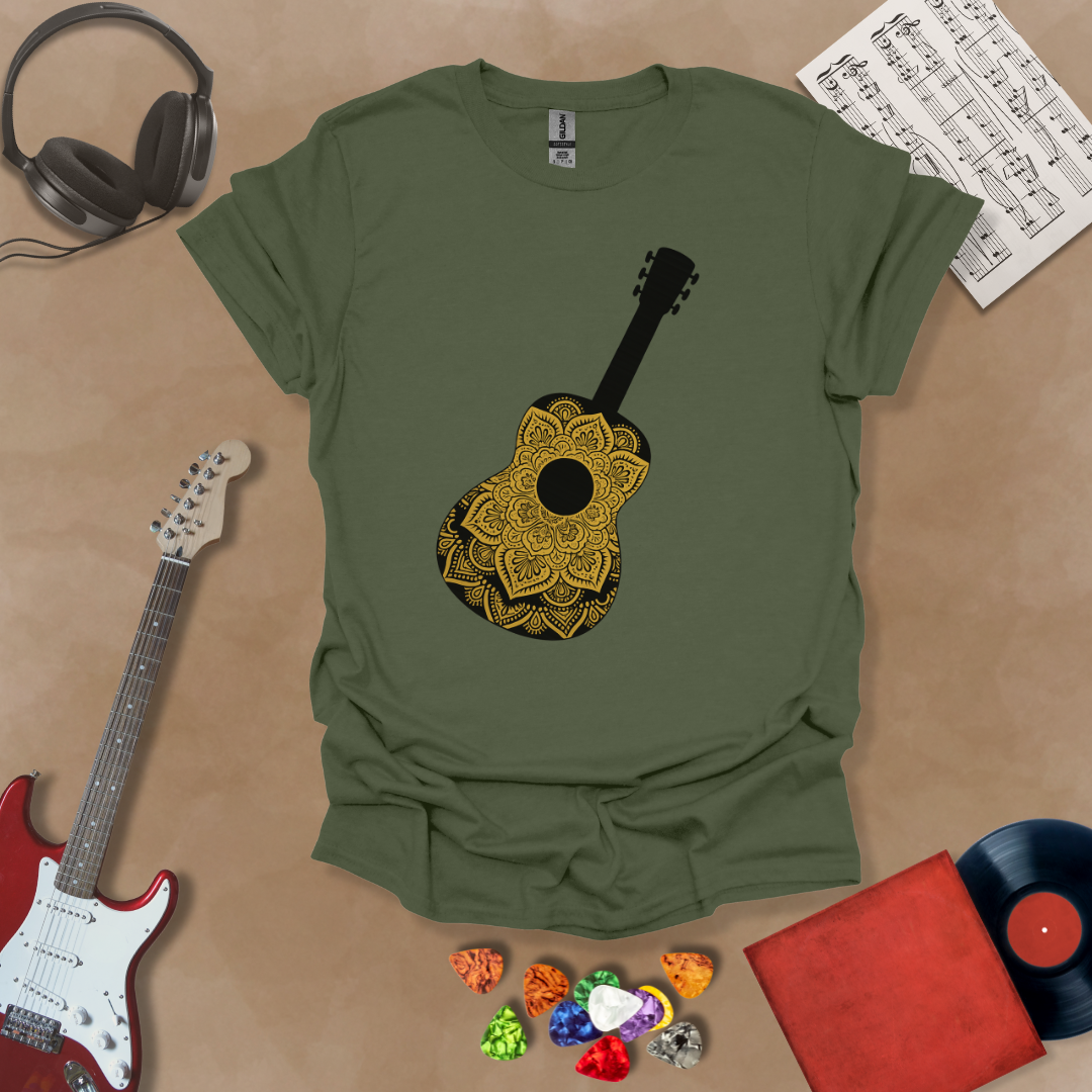 Green t-shirt with mandala pattern shaped like guitar body.
