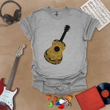 Gray t-shirt with mandala pattern shaped like guitar body.

