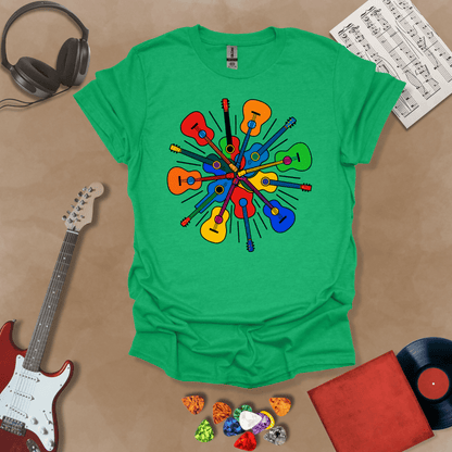 Green t-shirt featuring a colorful burst of acoustic guitars arranged in a radial explosion pattern, creating a kaleidoscope effect.