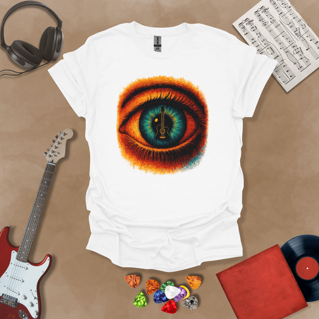 White t-shirt featuring a fiery psychedelic eye with a glowing iris and a guitar silhouette at the center of the pupil.
