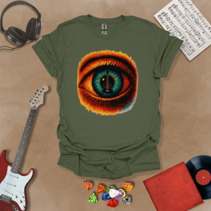 Green t-shirt featuring a fiery psychedelic eye with a glowing iris and a guitar silhouette at the center of the pupil.
