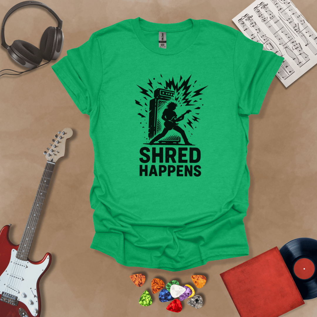 Green t-shirt with Guitarist shredding in front of amp with text 'Shred Happens'