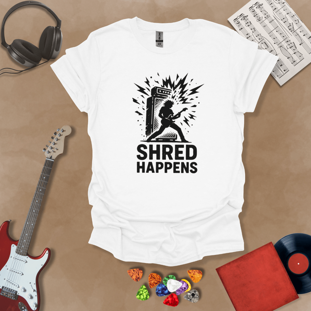 White t-shirt with Guitarist shredding in front of amp with text 'Shred Happens'
