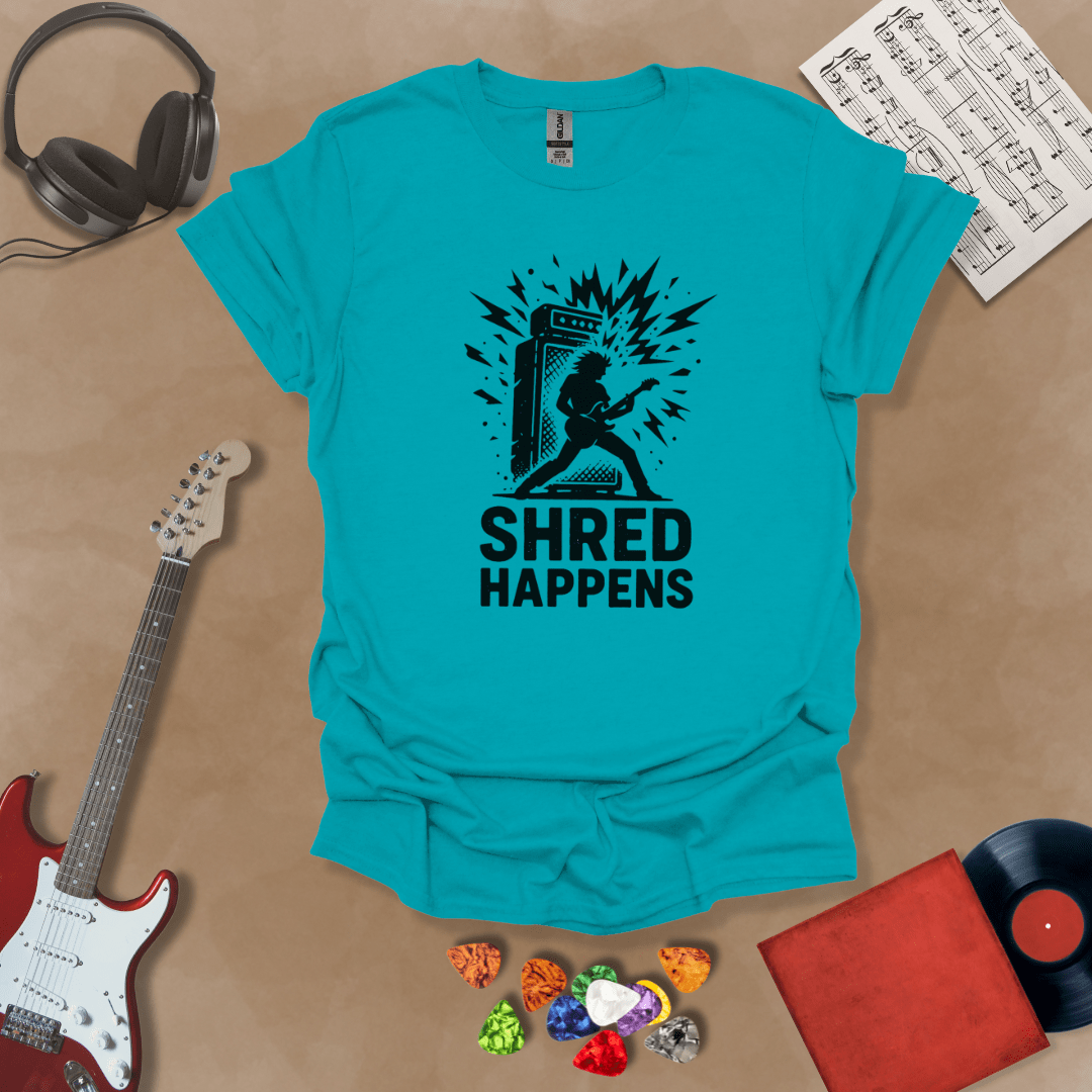 blue t-shirt with Guitarist shredding in front of amp with text 'Shred Happens'