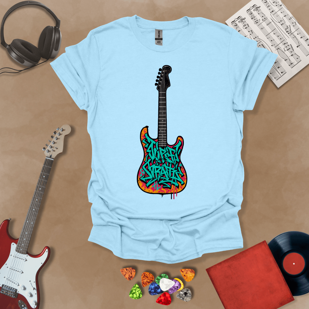 Light blue t-shirt featuring an electric guitar filled with colorful graffiti-style lettering and street art textures.
