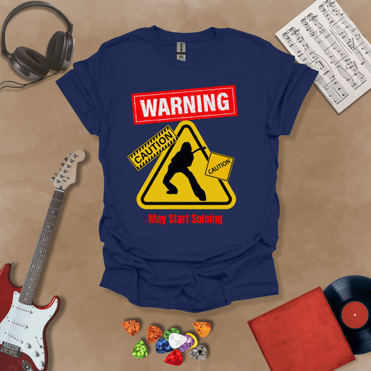 Navy t-shirt with bold red “Warning” text, yellow caution triangle with guitarist silhouette, text “May Start Soloing.”
