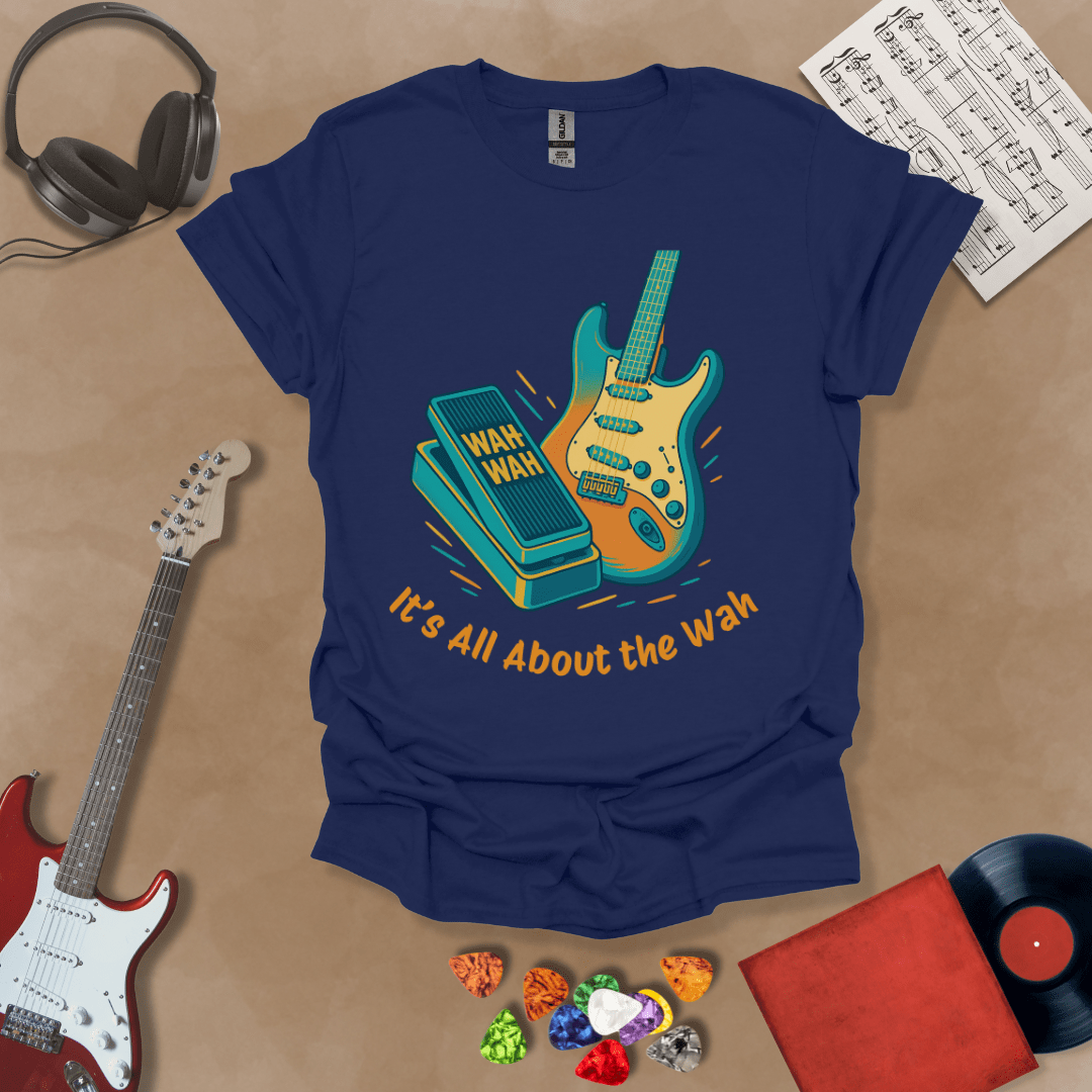 Navy t-shirt with bright color graphic guitar and wah wah pedal with text "It's all about the wah". 