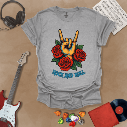 Gray t-shirt with orange hand in devil horns gesture, surrounded by red roses, text “Rock and Roll.”