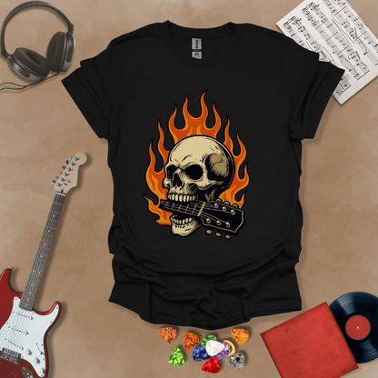 Black t-shirt with flaming skull graphic biting a guitar neck.