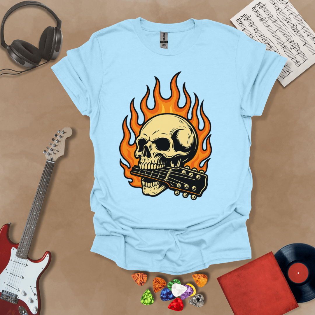 Light Blue t-shirt with flaming skull graphic biting a guitar neck.