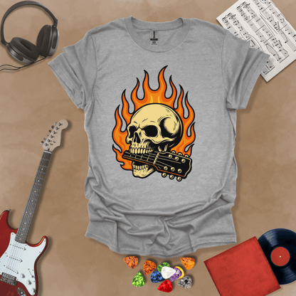 Gray t-shirt with flaming skull graphic biting a guitar neck.