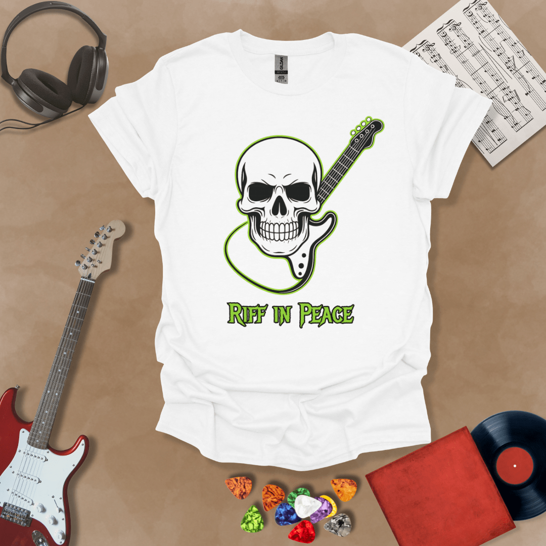 White t-shirt with neon green skull graphic holding guitar neck, text “Riff in Peace.”