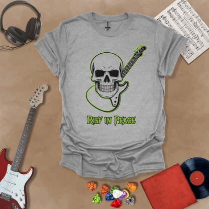 Gray t-shirt with neon green skull graphic holding guitar neck, text “Riff in Peace.”