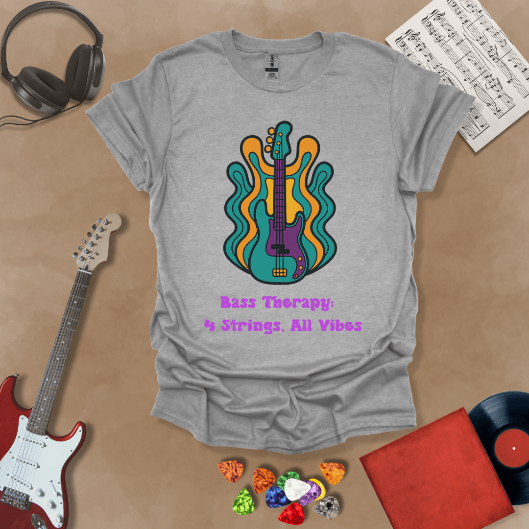 Gray t-shirt with psychedelic-style bass guitar illustration, colorful wavy accents, text “Bass Therapy: 4 Strings, All Vibes