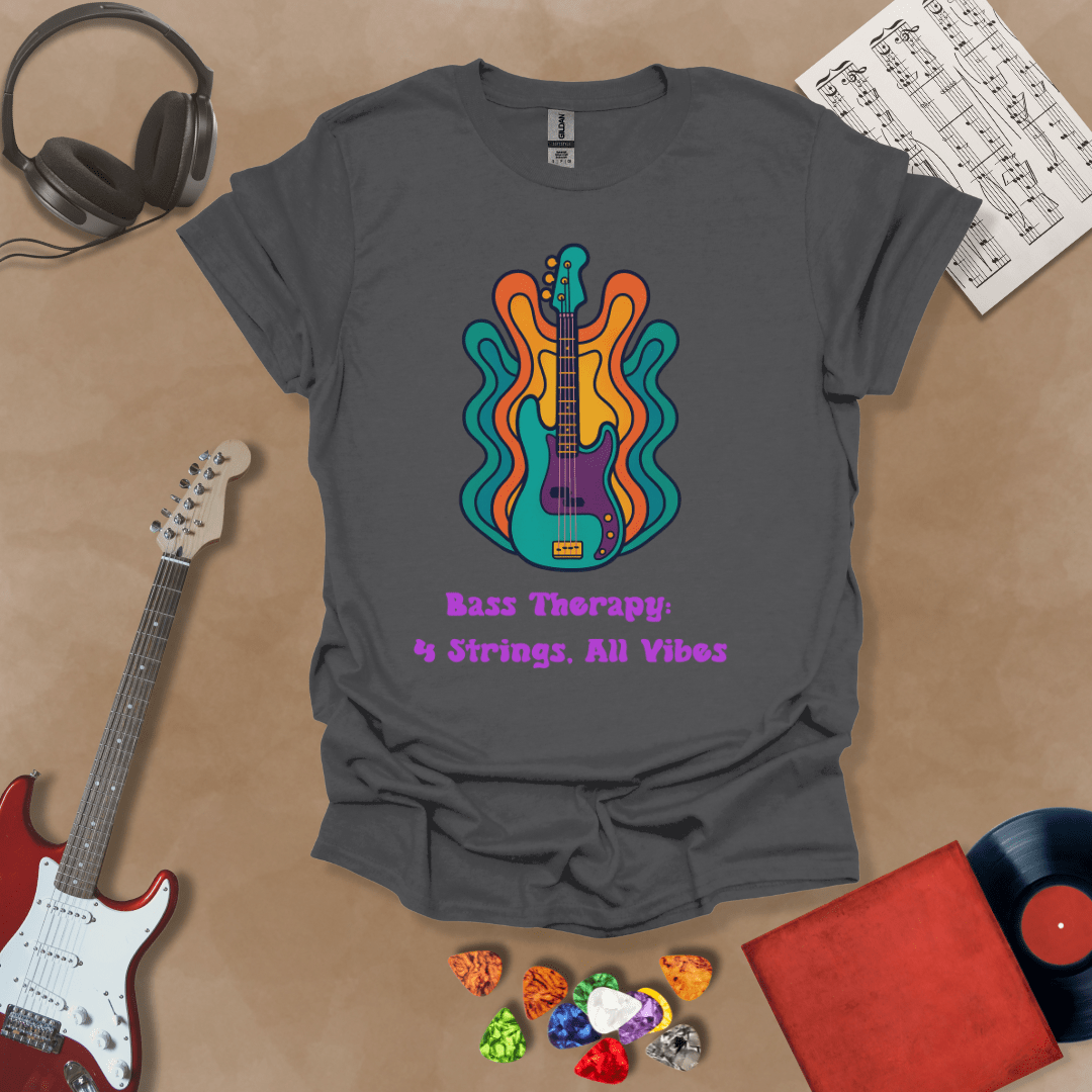 Gray t-shirt with psychedelic-style bass guitar illustration, colorful wavy accents, text “Bass Therapy: 4 Strings, All Vibes