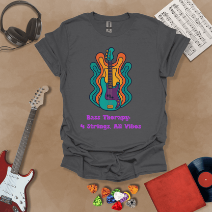 Gray t-shirt with psychedelic-style bass guitar illustration, colorful wavy accents, text “Bass Therapy: 4 Strings, All Vibes