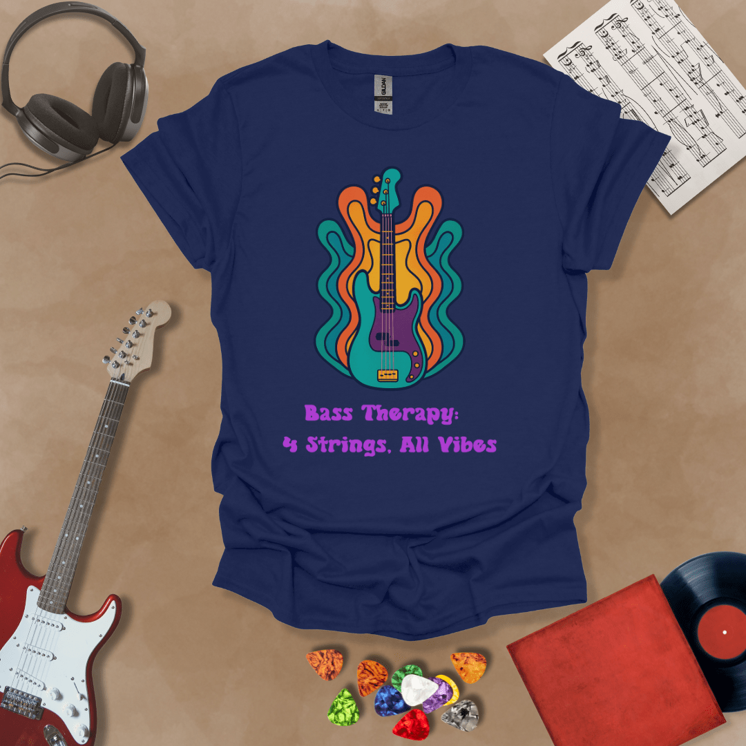 Navy t-shirt with psychedelic-style bass guitar illustration, colorful wavy accents, text “Bass Therapy: 4 Strings, All Vibes