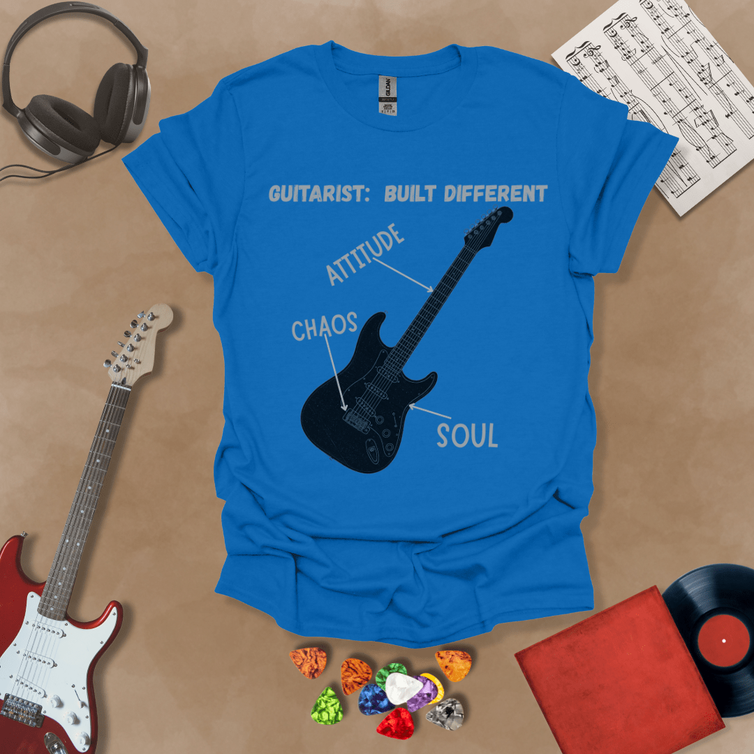 Blue t-shirt with black electric guitar diagram labeled “Attitude, Chaos, Soul,” text “Guitarist: Built Different.”