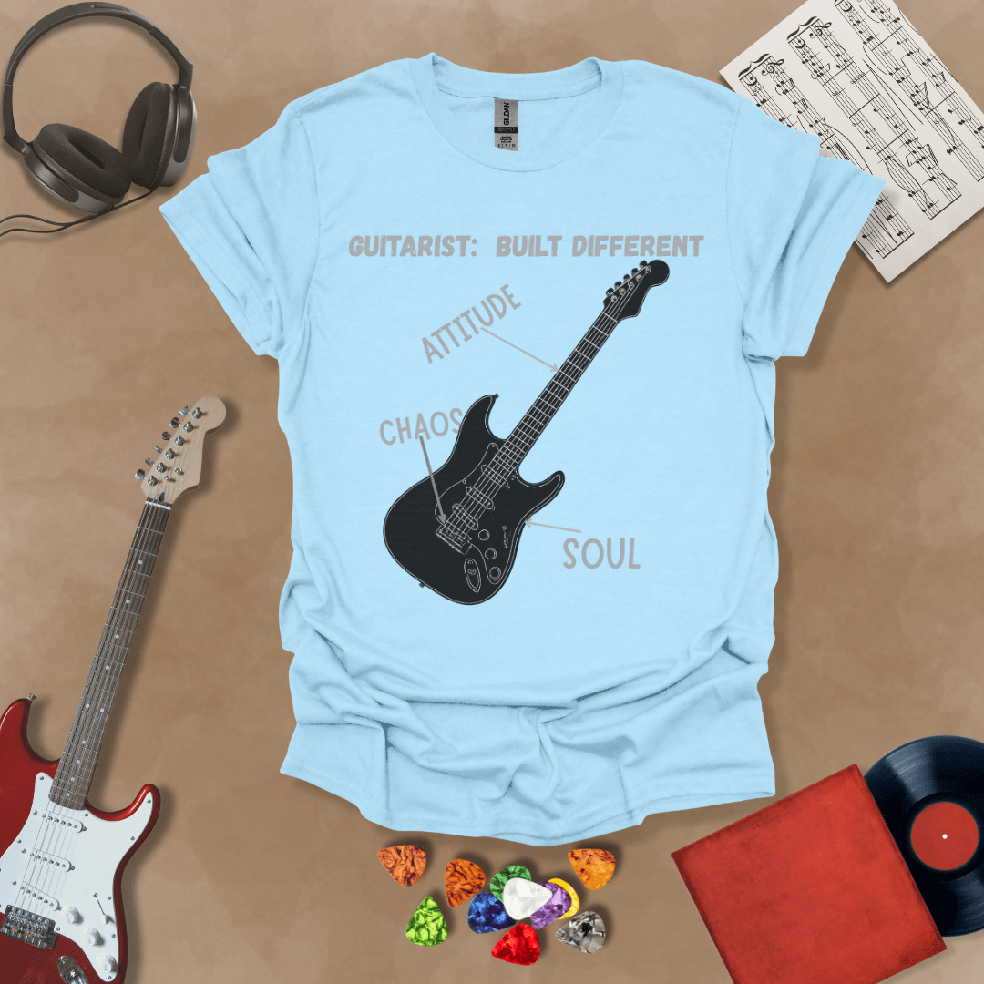 Light Blue t-shirt with black electric guitar diagram labeled “Attitude, Chaos, Soul,” text “Guitarist: Built Different.”