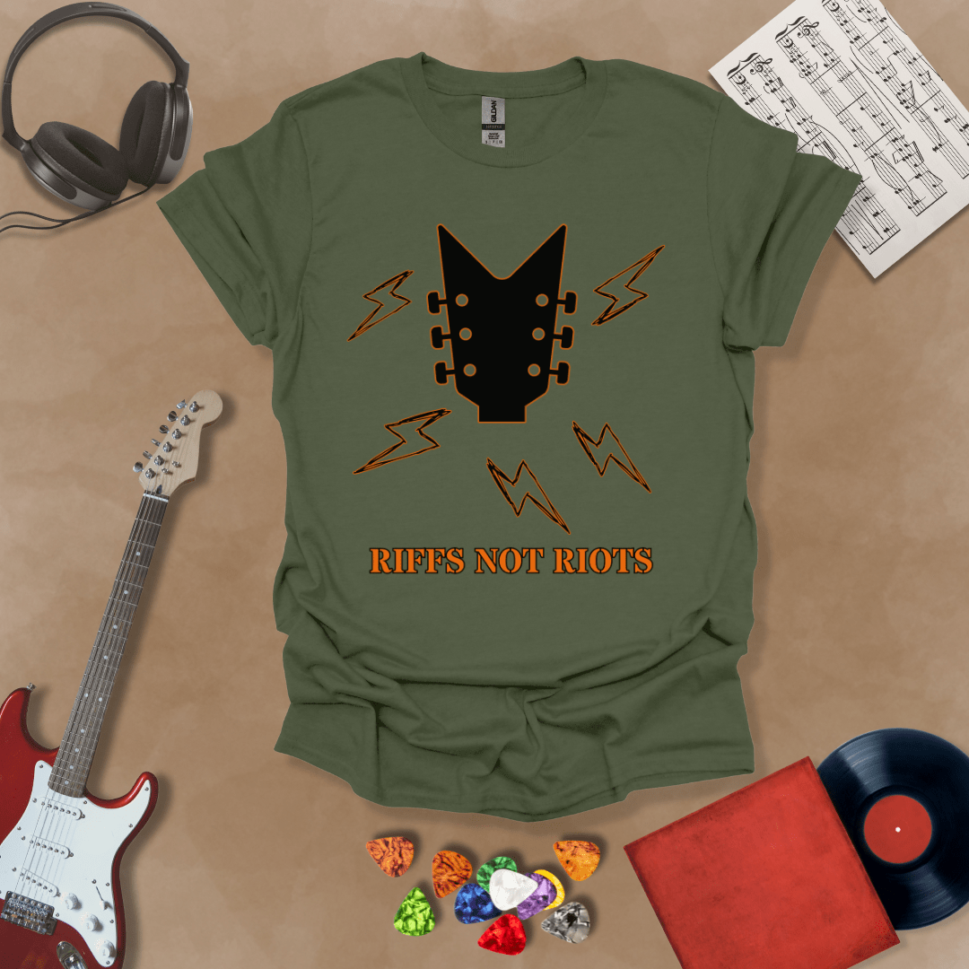 Green t-shirt with black guitar headstock and orange lightning bolts, text “Riffs Not Riots.”