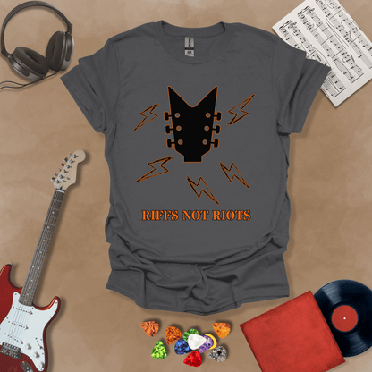 Gray t-shirt with black guitar headstock and orange lightning bolts, text “Riffs Not Riots.”