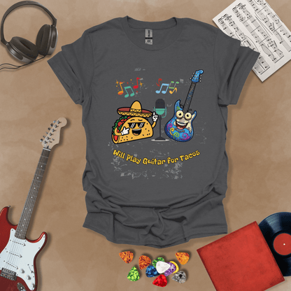 Gray t-shirt with cartoon taco wearing sombrero and sunglasses, psychedelic guitar character, text “Will Play Guitar for Tacos.”