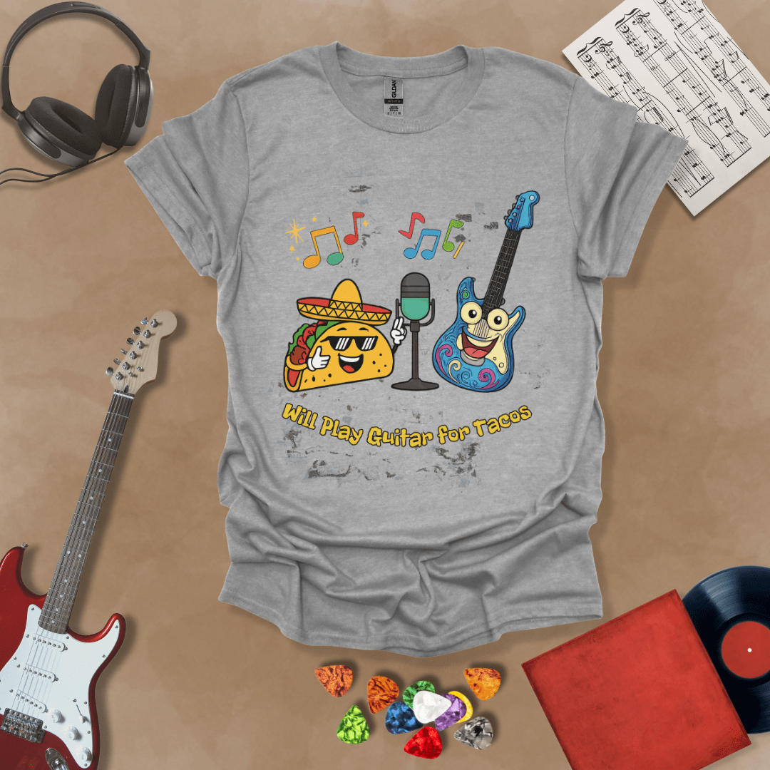 Gray t-shirt with cartoon taco wearing sombrero and sunglasses, psychedelic guitar character, text “Will Play Guitar for Tacos.”