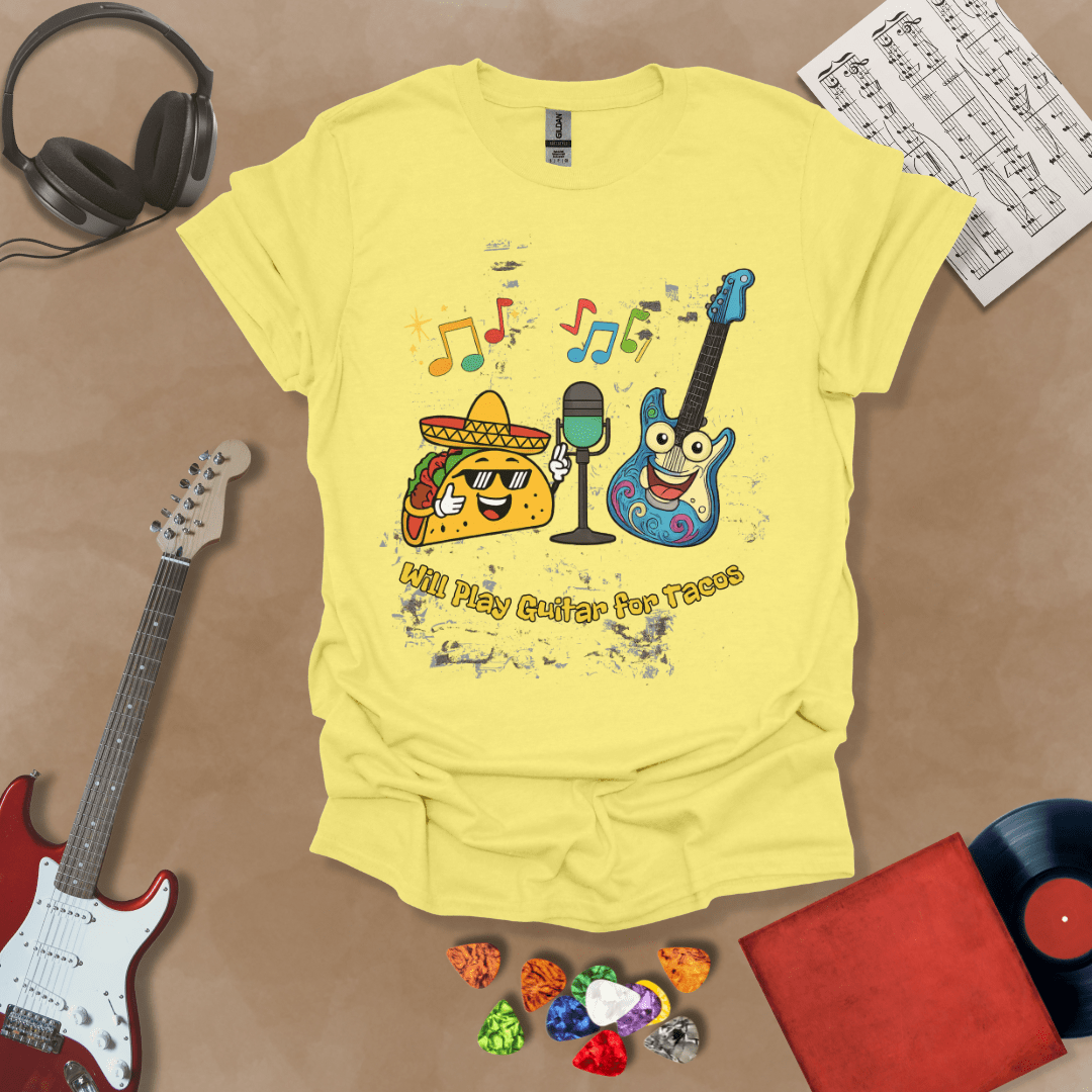 Yellow t-shirt with cartoon taco wearing sombrero and sunglasses, psychedelic guitar character, text “Will Play Guitar for Tacos.”