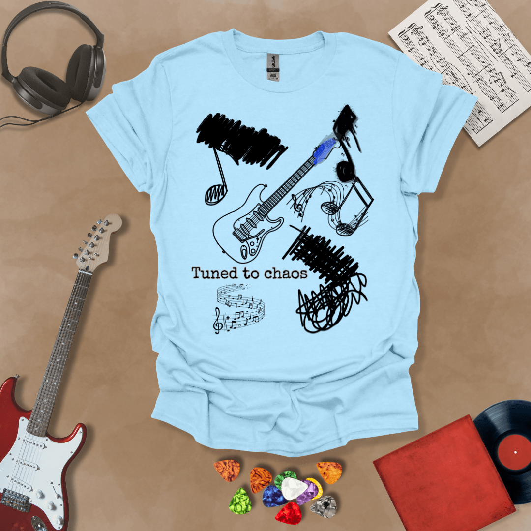 Light Blue t-shirt with Grunge-style electric guitar design with chaotic abstract lines and the phrase “Tuned to Chaos,” optimized for light shirts like white and sand.