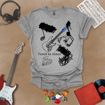Gray t-shirt with Grunge-style electric guitar design with chaotic abstract lines and the phrase “Tuned to Chaos,” optimized for light shirts like white and sand.
