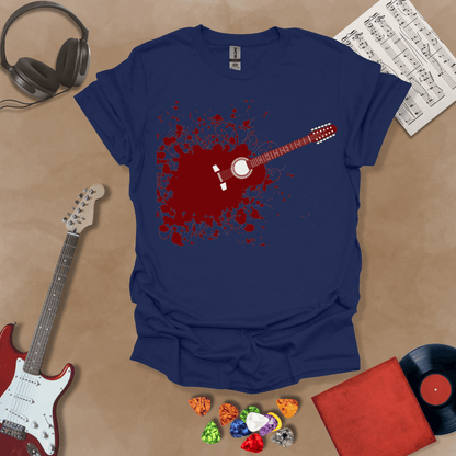 Blue t-shirt with Abstract splatter-style electric guitar design with six strings exploding outward, bold and edgy graphic.