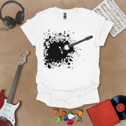 White t-shirt with Abstract splatter-style electric guitar design with six strings exploding outward, bold and edgy graphic.