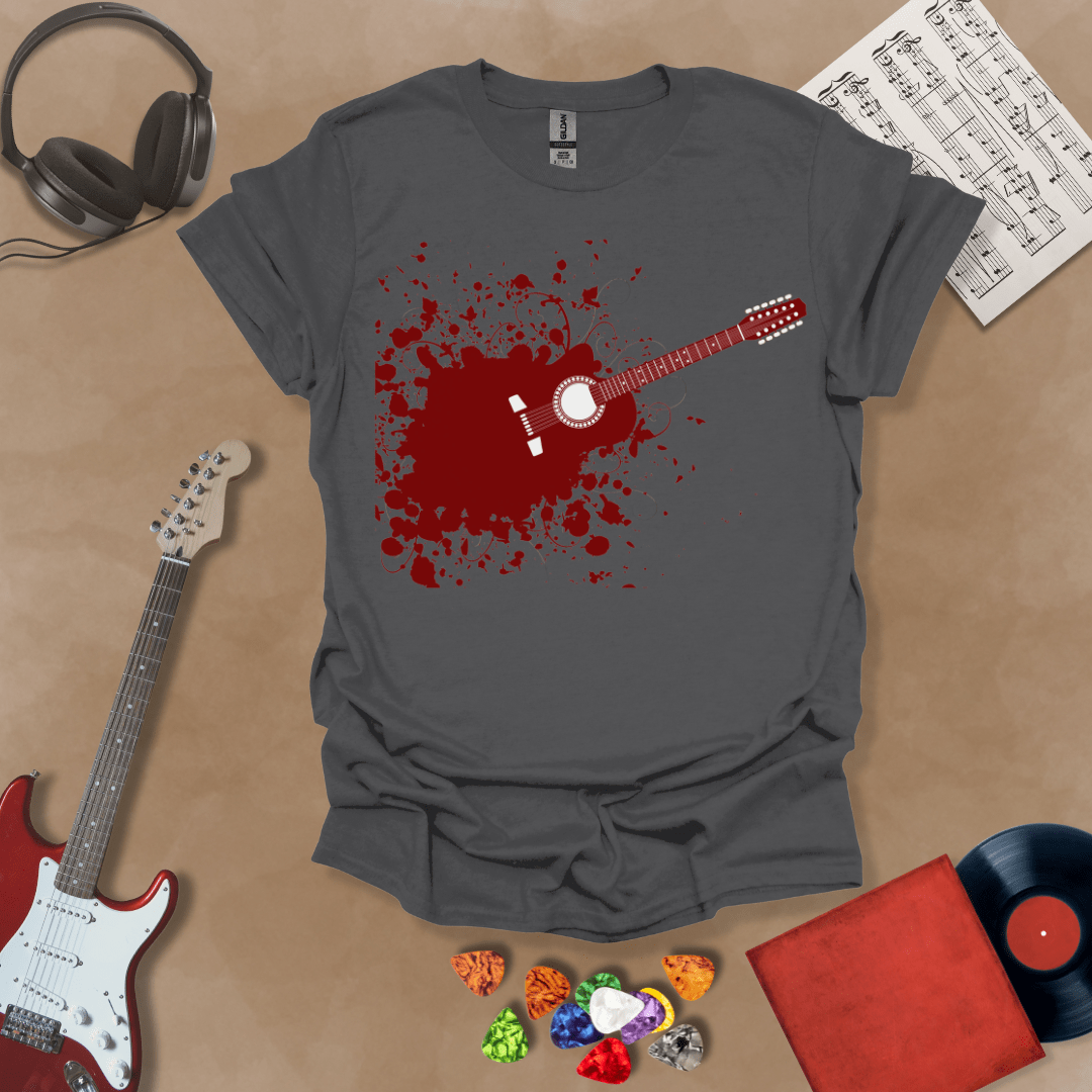 Charcoal t-shirt with Abstract splatter-style electric guitar design with six strings exploding outward, bold and edgy graphic.