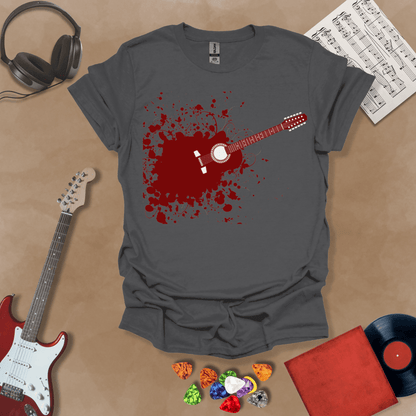 Charcoal t-shirt with Abstract splatter-style electric guitar design with six strings exploding outward, bold and edgy graphic.