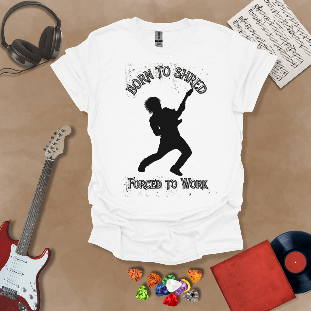 White t-shirt with Silhouette of a guitarist rocking out with glowing  accents, framed by the text 'Born to Shred, Forced to Work' in bold distressed lettering.