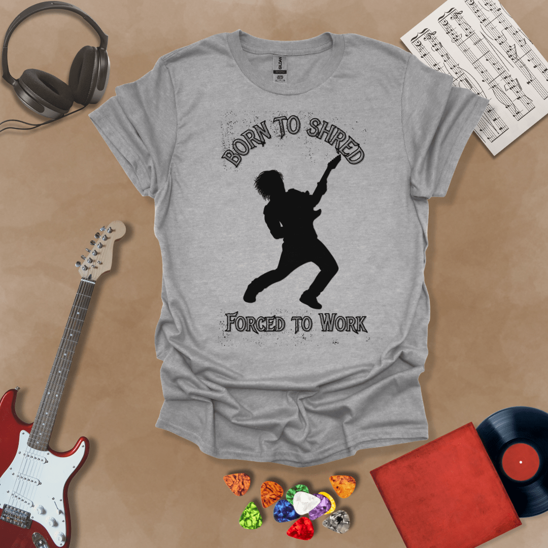 Gray t-shirt with Silhouette of a guitarist rocking out with glowing accents, framed by the text 'Born to Shred, Forced to Work' in bold distressed lettering.