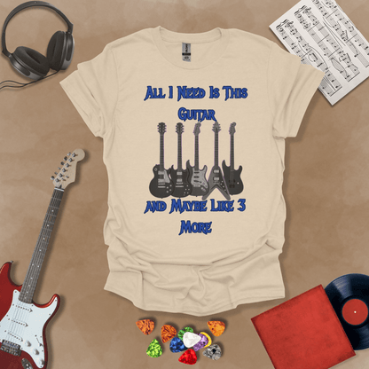 Beige t-shirt with Row of five electric guitars with neon glow accents under bold blue text reading ‘All I Need Is This Guitar and Maybe Like 3 More,’ rock-inspired graphic t-shirt design