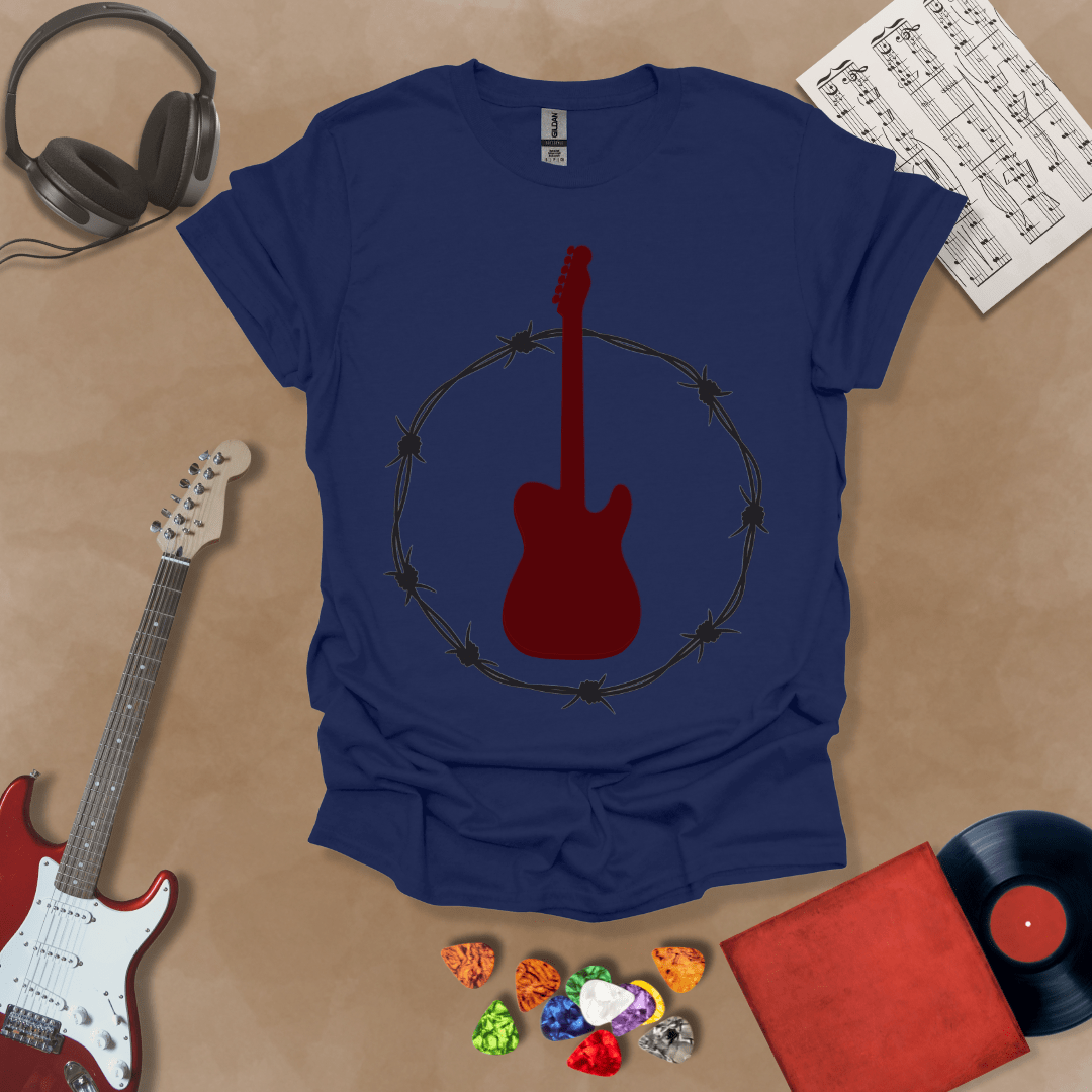 Navy t-shirt with Blood-red electric guitar glowing inside a circle of metallic barbed wire, bold rock graphic for dark shirts.