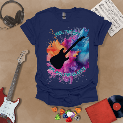 Navy T-shirt with Black electric guitar silhouette with vibrant paint splash explosion in orange, pink, purple, and blue. Text reads ‘Feel the Riff, Splash the Silence.