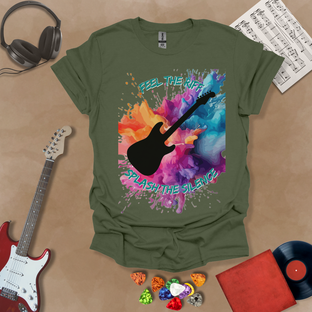 Green T-shirt with Black electric guitar silhouette with vibrant paint splash explosion in orange, pink, purple, and blue. Text reads ‘Feel the Riff, Splash the Silence.