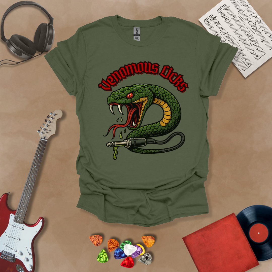 Green t-shirt with graphic of Green snake striking with fangs bared, wrapped around a guitar cable plug, dripping venom, bold gothic red “Venomous Licks” text above.