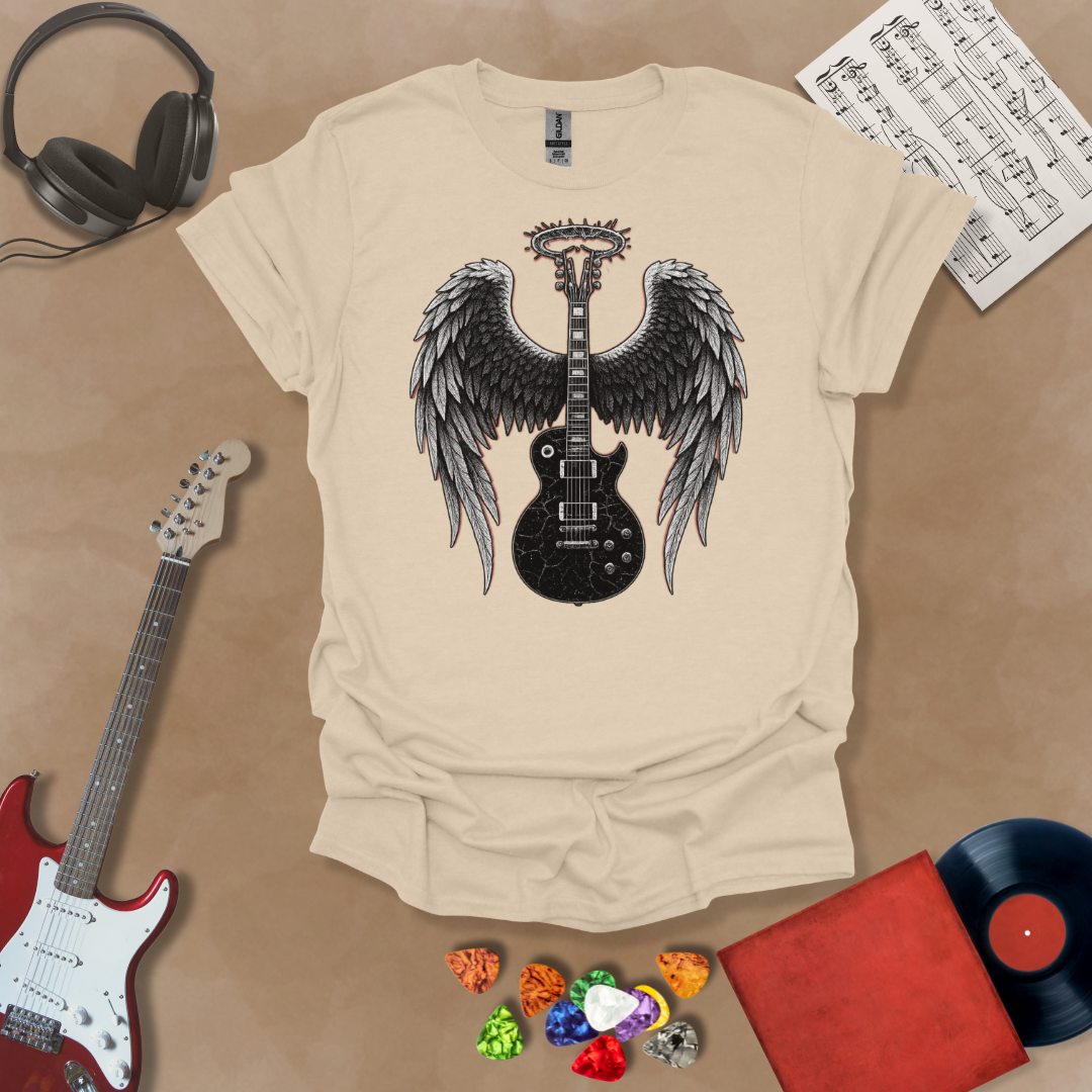 Beige t-shirt with Black electric guitar with angel wings and a cracked halo—dark gothic design from the Fallen Angel: Broken Halo tee by Riff Junkie.
