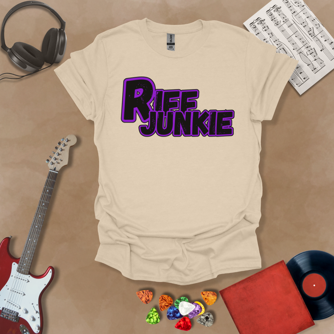 Beige T-shirt with Riff Junkie Logo T-Shirt in Stage Light Edition featuring purple-outlined logo on light background, artistic glow design inspired by stage lighting.