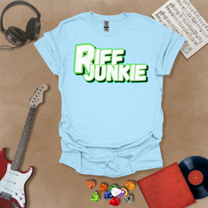 Light Blue T-shirt with Riff Junkie Logo in Light Glow Edition showing white and green outline logo with soft glow, perfect for light shirts and clean stage style.